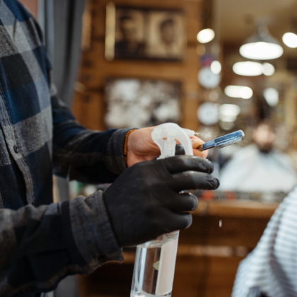 Barber cleaning a blade